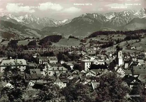 AK / Ansichtskarte Immenstadt Allgaeu Ortsansicht mit Kirche Alpenpanorama