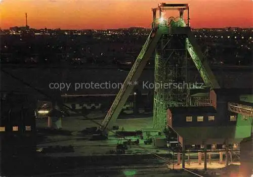 AK / Ansichtskarte Suedafrika Southafrica RSA Mining Gold Mine at night showing typical headgear