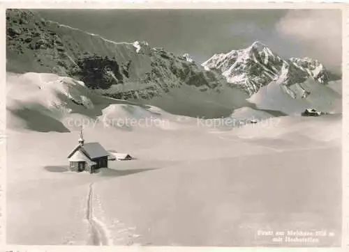 AK / Ansichtskarte Frutt_Melchsee Frutt_OW Winterpanorama mit Hochstollen Kapelle Sporthotel Hotel Kurhaus Frutt 