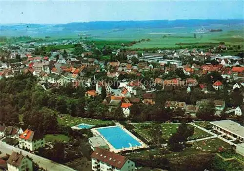 AK / Ansichtskarte Langenau Wuerttemberg Stadtpanorama mit Freibad