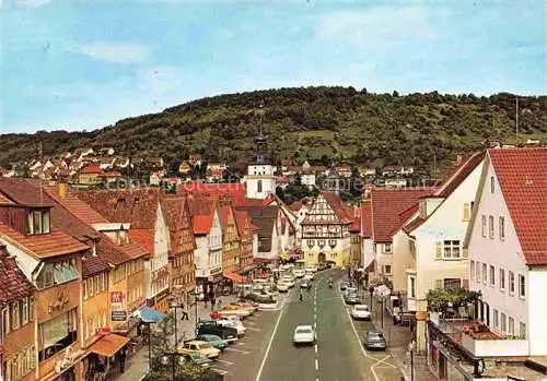 AK / Ansichtskarte Kuenzelsau Hauptstrasse mit Rathaus und ev. Kirche