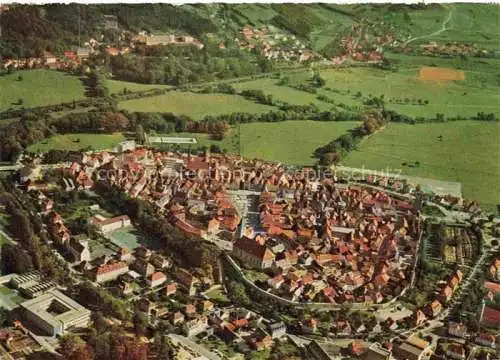 AK / Ansichtskarte Bad Neustadt Saale Bayern Kurort im Naturpark Bayerische Rhoen im Hintergrund Badeviertel