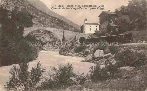 AK / Ansichtskarte Visp Viege VS Eisenbahn Visp-Zermatt Partie am Fluss Bruecke