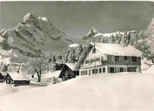 AK / Ansichtskarte Braunwald GL Hotel Pension Ahorn Winterlandschaft Alpen