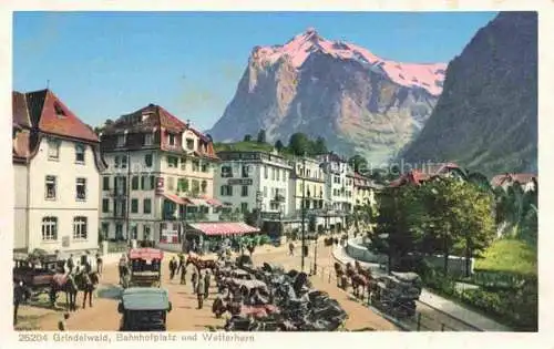 AK / Ansichtskarte Grindelwald BE Bahnhofplatz Blick gegen Wetterhorn Berner Alpen