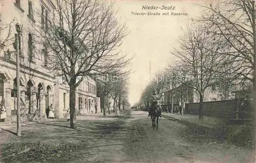 AK / Ansichtskarte Nieder-Jeutz Niederjeutz Thionville 57 Moselle Trierer Strasse mit Kaserne Soldat zu Pferd