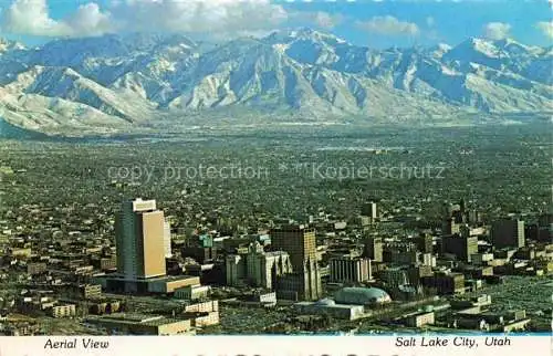 AK / Ansichtskarte Salt Lake City Utah USA Aerial view of downtown L.D.S. Church Office Building Mormon Temple Mormon Tabernacle Wasatch Mountain in the background