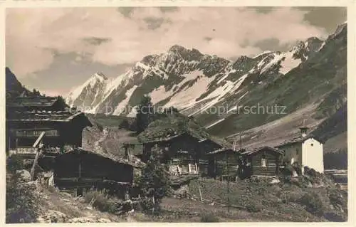 AK / Ansichtskarte Eisten Visp Loetschental VS Dorfansicht Blick gegen Sattelhorn Schienhorn