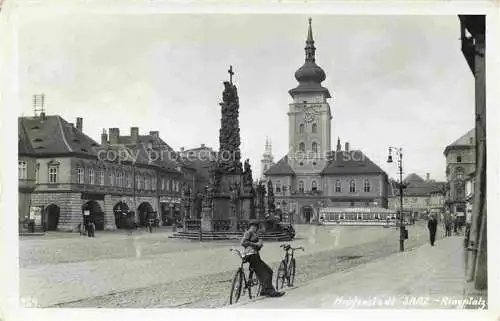 AK / Ansichtskarte Saaz Zatec Aussig CZ Ringplatz Dreifaltigkeitssaeule Rathaus