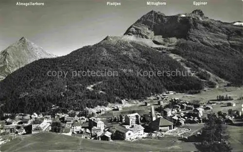 AK / Ansichtskarte Saas-Fee VISP VS mit Almagellerhorn Plattjen Mittagshorn und Egginer Fliegeraufnahme