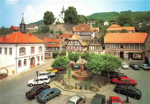 AK / Ansichtskarte Zwingenberg Bergstrasse Hessen 
Ortszentrum Brunnen Fachwerkhaeuser Rathaus Blick zur Kirche