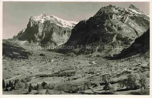 AK / Ansichtskarte Grindelwald BE Panorama Blick gegen Wetterhorn Mettenberg Schreckhorn Berner Alpen