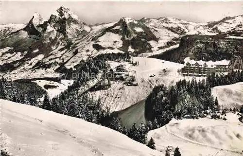 AK / Ansichtskarte Stoos SZ Sporthotel Stoos mit Stoosbahn und Mythen Fliegeraufnahme