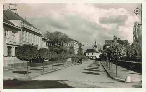 AK / Ansichtskarte Kohl-Janowitz Kohljanowitz Uhlirske Janovice Kuttenberg CZ Hauptstrasse Blick zur Kirche