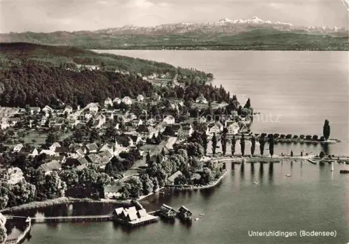 AK / Ansichtskarte Unteruhldingen-Muehlhofen Bodensee Panorama Hafen Schweizer Alpen