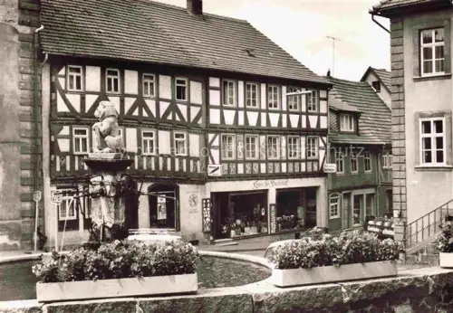 AK / Ansichtskarte Tann Rhoen Fulda Hessen Marktplatz Brunnen Altstadt Fachwerkhaeuser