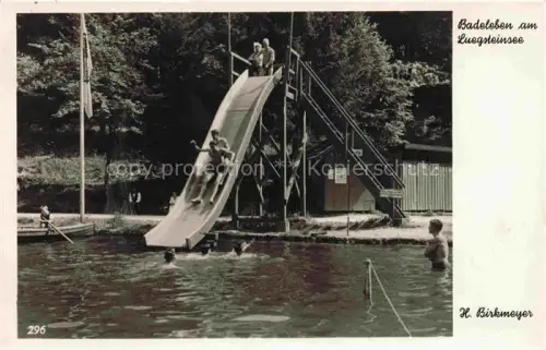 AK / Ansichtskarte Luegsteinsee Brannenburg Rosenheim Bayern Strandbad mit Wasserrutschbahn