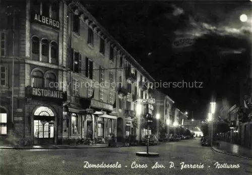 AK / Ansichtskarte Domodossola Piemonte IT Corso Av. Paolo Ferraris notturno