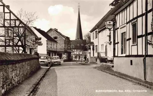AK / Ansichtskarte Ruppichteroth Rhein-Sieg-Kreis NRW Ortspartie Blick zur Kirche