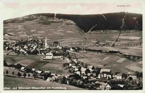 AK / Ansichtskarte Oberwiesenthal Erzgebirge Sachsen und Boehmisch Wiesenthal mit Fichtelberg