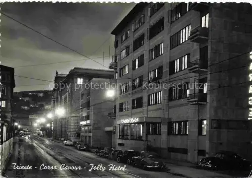 AK / Ansichtskarte TRIESTE Triest IT Corso Cavour Jolly Hotel di notte