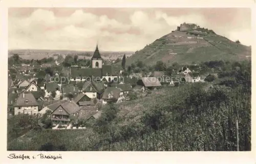 AK / Ansichtskarte Staufen  Breisgau Ortsansicht mit Kirche Blick zur Burg