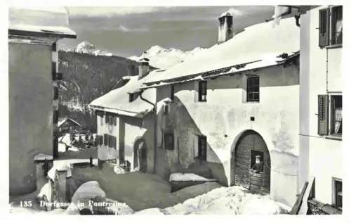 AK / Ansichtskarte Pontresina GR Dorfgasse im Winter