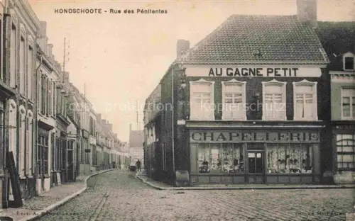 AK / Ansichtskarte Hondschoote Dunkerque 59 Nord Rue des Pénitentes Chapellerie