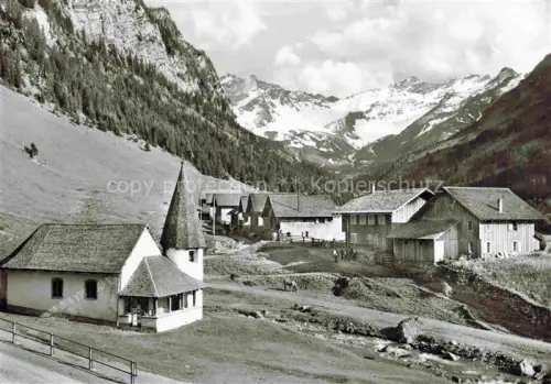 AK / Ansichtskarte Steg Saminatal Liechtenstein Bergdorf Ansicht mit Kirche Alpen