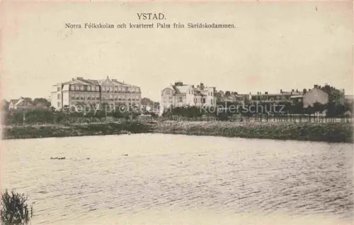 AK / Ansichtskarte Ystad Skane Lan Sweden Norra Folkskolan och kvarteret Palm fran Skridskodammen