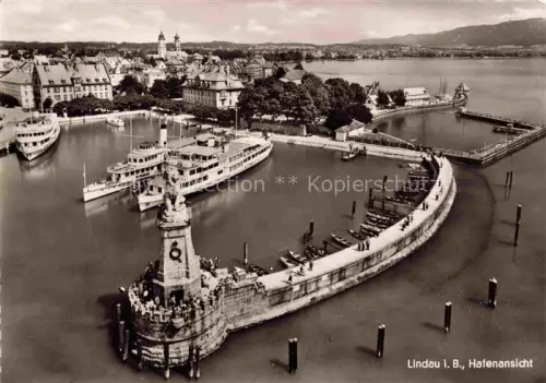 AK / Ansichtskarte Dampfer Binnenschifffahrt Lindau Bodensee Hafenansicht Leuchtturm 