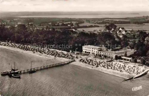 AK / Ansichtskarte Timmendorfer Strand Timmendorferstrand Timmendorf Fliegeraufnahme mit Seebruecke
