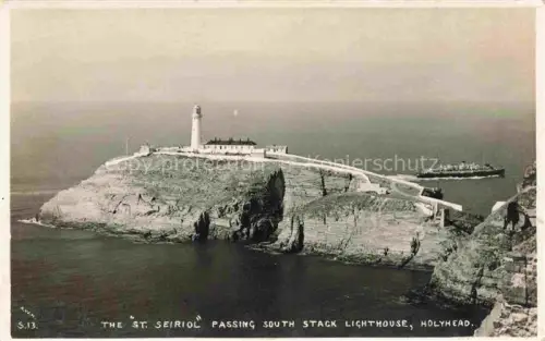 AK / Ansichtskarte Holyhead Isle of Anglesey Wales UK The St Seiriol Passing South Stack Lighthouse