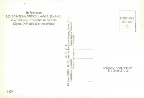 AK / Ansichtskarte LES SAINTES-MARIES-DE-LA-MER 13 Bouches-du-Rhone Vue aerienne Ensemble de la Ville l'Eglise et les arenes