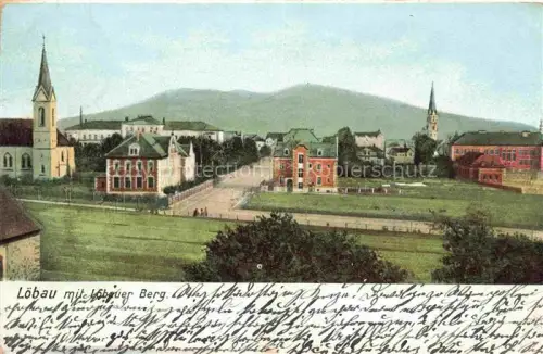 AK / Ansichtskarte Loebau Sachsen Teilansicht mit Kirchen Blick gegen Loebauer Berg