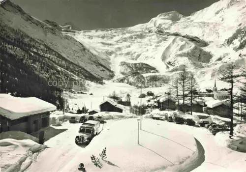 AK / Ansichtskarte Saas-Fee VISP VS Parkplatz Postauto Allalinhorn Alphubel Wintersportplatz Walliser Alpen