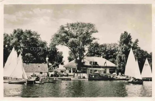 AK / Ansichtskarte Grouw Friesland NL Gaststaette Restaurant am Wasser Bootsanleger Segelboot