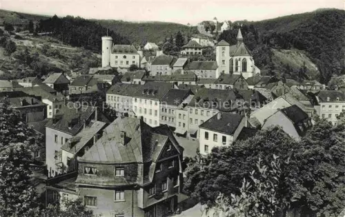 AK / Ansichtskarte Neuerburg Eifel Bitburg-Pruem Rheinland-Pfalz Teilansicht mit Kirche Luftkurort