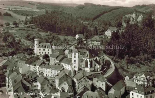 AK / Ansichtskarte Neuerburg Eifel Bitburg-Pruem Rheinland-Pfalz Altstadt mit Kirche
