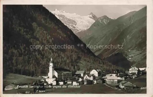 AK / Ansichtskarte Neustift  Stubaital Tirol AT Ortsansicht mit Kirche Blick gegen die Gletscher Stubaier Alpen