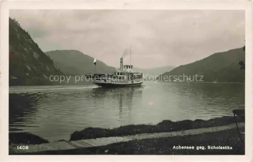 AK / Ansichtskarte Achensee Tirol AT Uferpartie am See Blick gegen Scholastika Fahrgastschiff