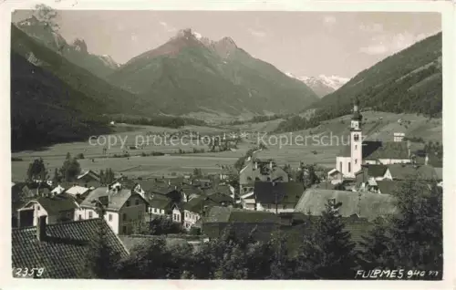AK / Ansichtskarte Fulpmes Innsbruck Tirol AT Teilansicht mit Kirche Panorama Alpen