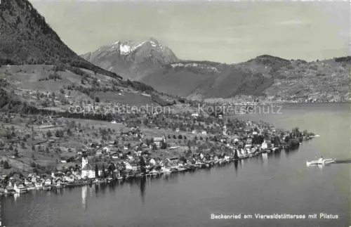 AK / Ansichtskarte Beckenried Vierwaldstaettersee NW Fliegeraufnahme mit Pilatus