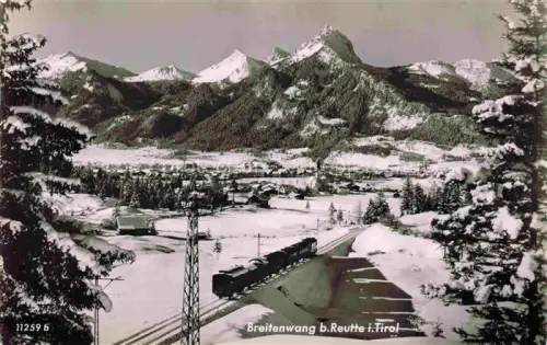 AK / Ansichtskarte Breitenwang Ausserfern Reutte Tirol Winterpanorama Alpen Eisenbahn