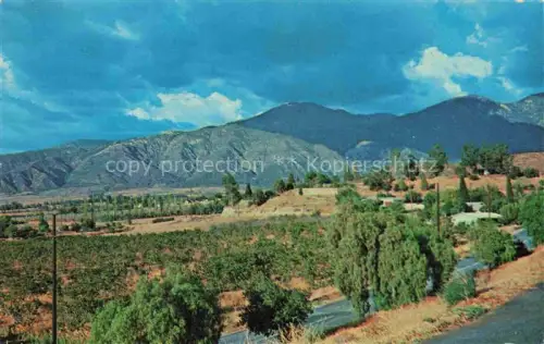 AK / Ansichtskarte Yucaipa California USA Storm clouds over San Bernardino Peak viewed from Flagg Hill