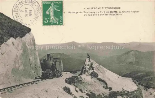 AK / Ansichtskarte Le Puy de Dome Clermont-Ferrand 63 Puy-de-Dome Passage du tramway au Grand Rocher et vue prise sur les Puys Nord