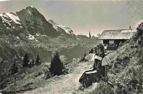 AK / Ansichtskarte Grindelwald BE Berghaus Waldspitz mit Eiger und Jungfrau Berner Alpen Trachten