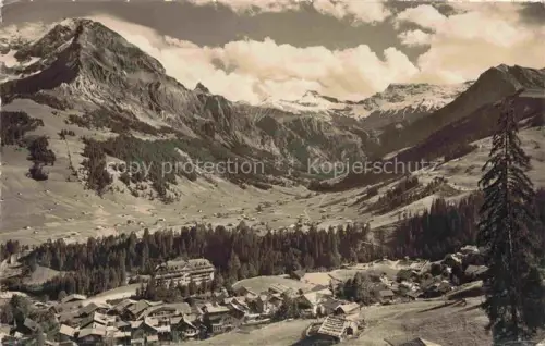 AK / Ansichtskarte Adelboden Frutigen BE und Boden Dorfpartie mit Palace-Hotel und Schwimmbad Berner Alpen