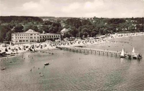 AK / Ansichtskarte Timmendorfer Strand Timmendorferstrand Timmendorf Kurhotel Seeschloesschen Seebruecke Fliegeraufnahme