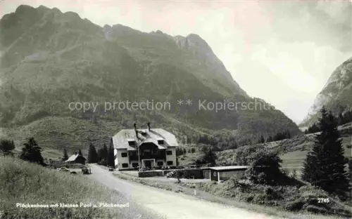 AK / Ansichtskarte Ploeckenhaus 1250m Koetschach-Mauthen Kaernten AT mit kleinen Paal und Ploeckenpass